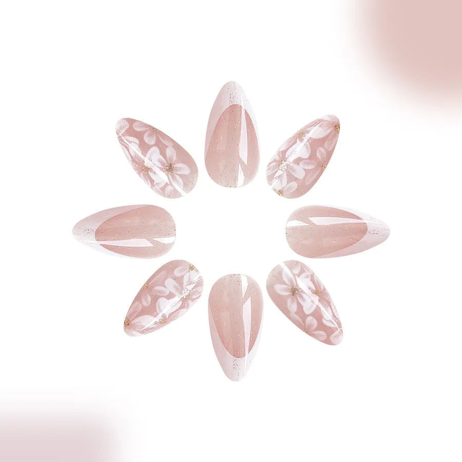 Short almond French style nails with glitter powder flower design in C625 colour