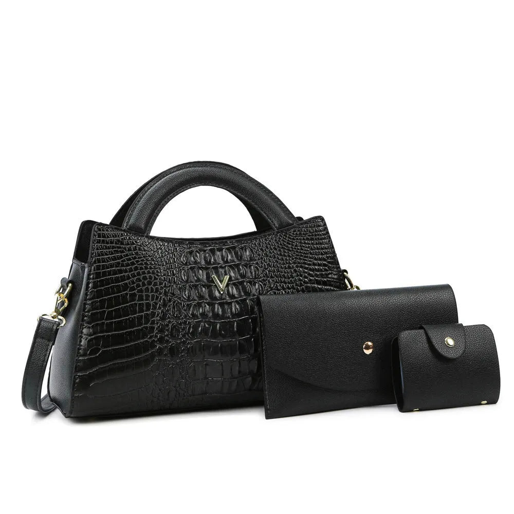 Women's black crocodile pattern PU leather crossbody bag showing internal phone and document pockets.