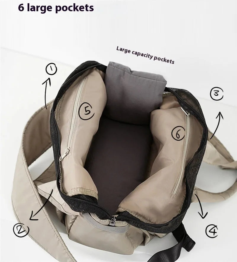 Apricot coloured cloth pet carrier handbag showing breathable fabric and portable design