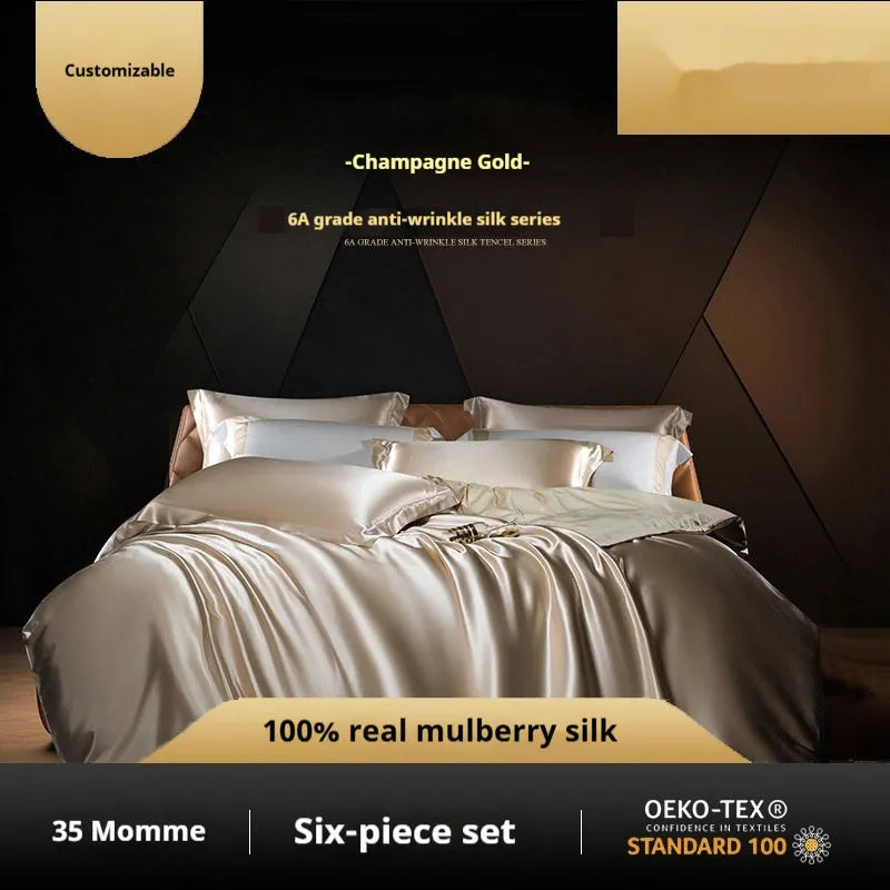 Solid colour silk quilt cover set on a bed in champagne gold, showing flat sheet and pillowcases.