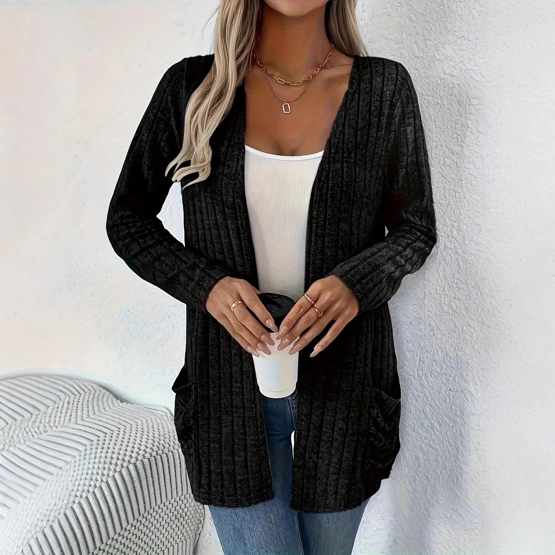 Women's loose-fit long sleeve cardigan with pockets in granny grey, shown on a hanger.