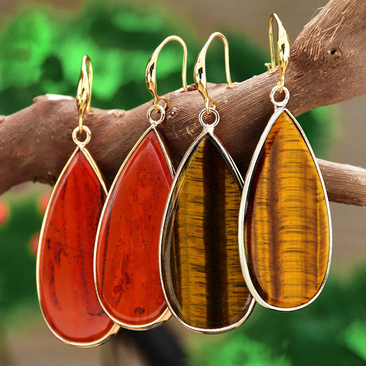 Vintage drop-shaped stone earrings in Tigereye, amethyst, pink crystal, Redstone, or turquoise colours.