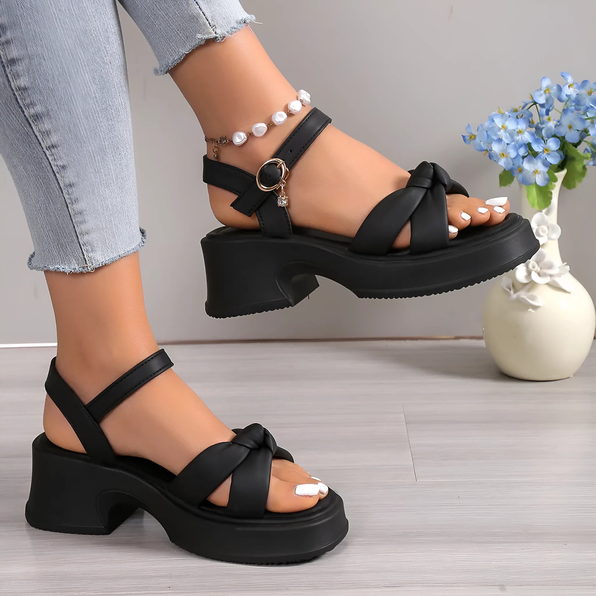 Black women's high heel slippers with thick rubber sole and button fastening