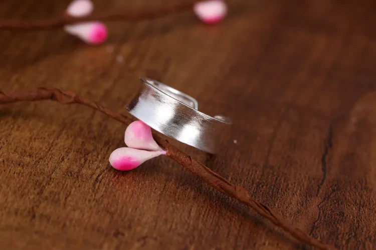 Sterling silver geometric open ring with frosted finish and adjustable opening