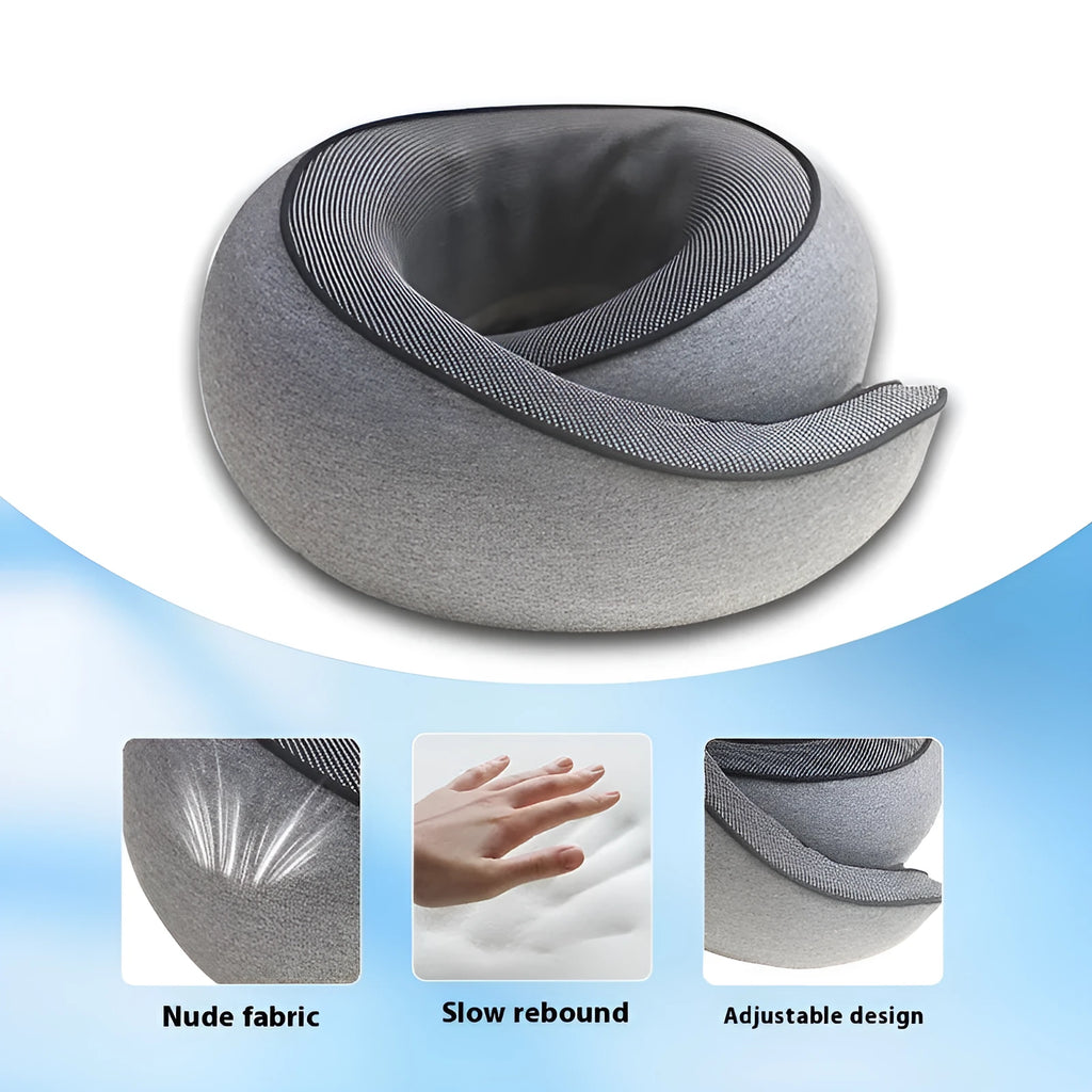 U-shaped memory foam travel neck pillow in a storage bag, shown in dark grey colour.