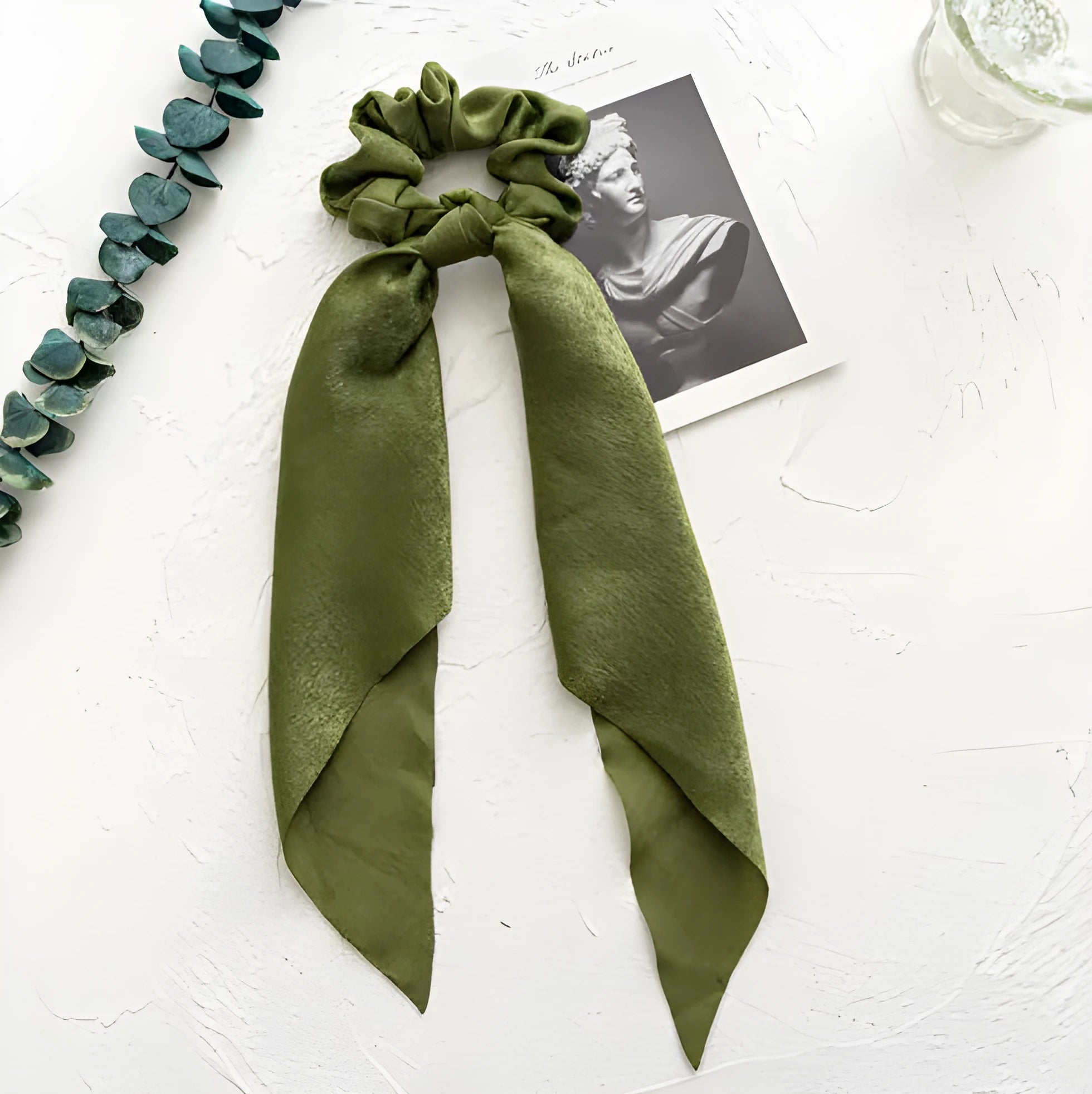 Long ribbon bandeau hair tie with large intestine ring closure in spring dark green cloth fabric
