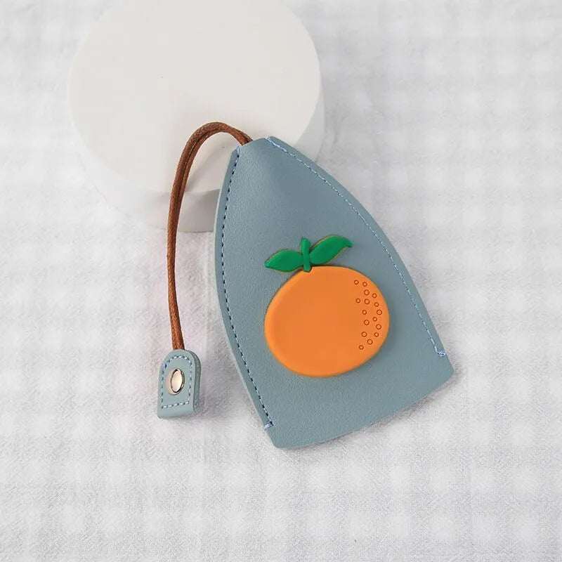 Cartoon pull-out car key case in PU leather with colourful designs measuring 14 x 7.5 cm