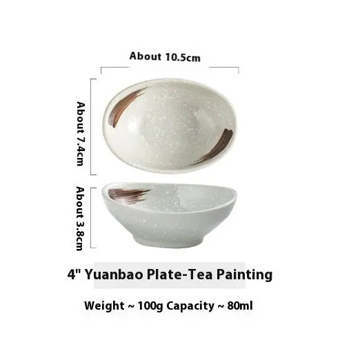 Japanese ceramic oval sauce dipping bowl with traditional underglaze pattern on white background