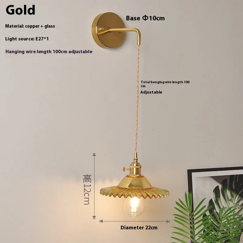 Copper retro lotus wall lamp with glass shade in amber colour variation