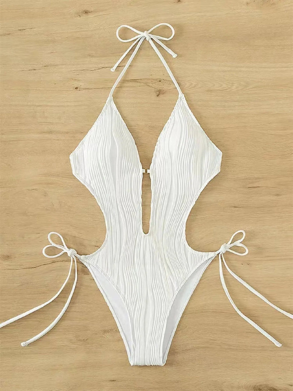 Women's black triangle bikini swimsuit with front lace-up closure