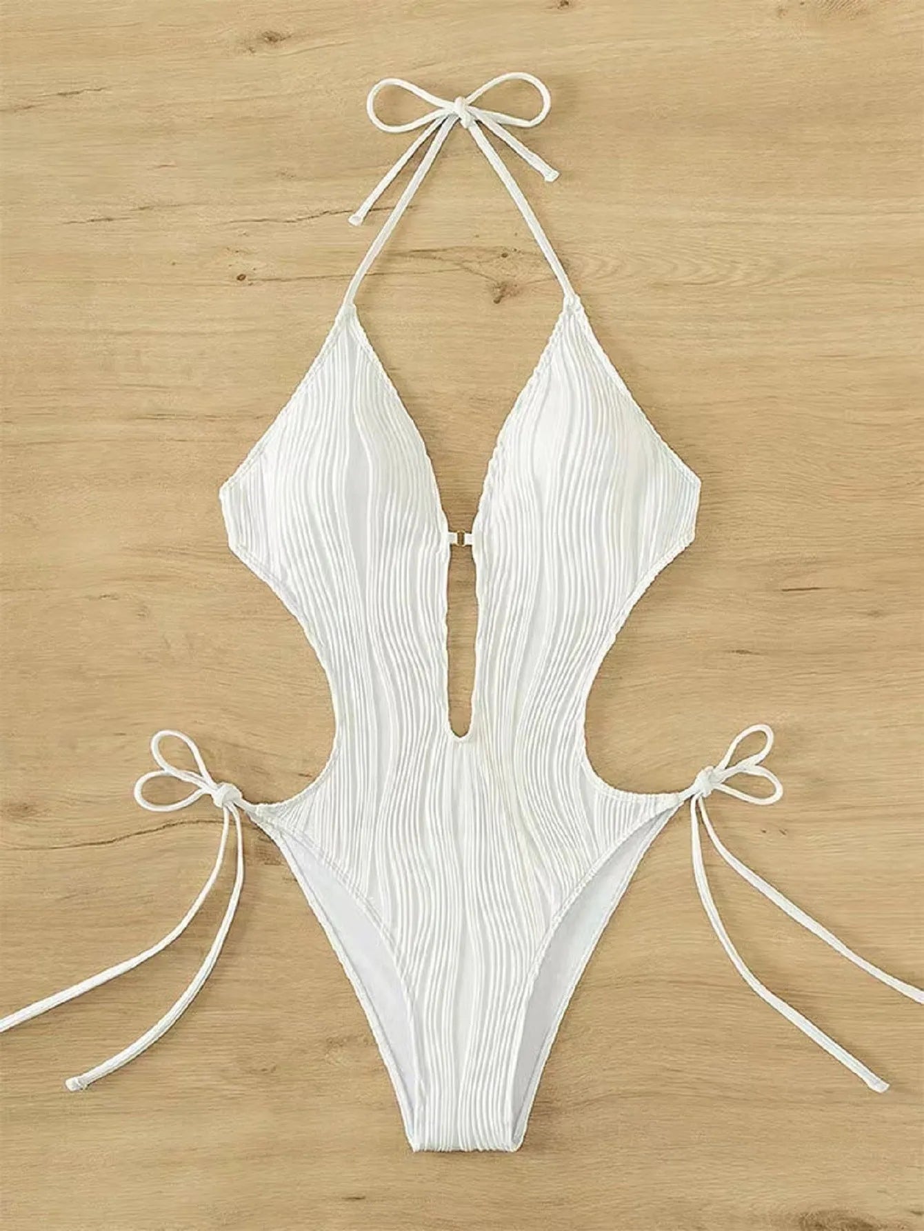 Women's black triangle bikini swimsuit with front lace-up closure