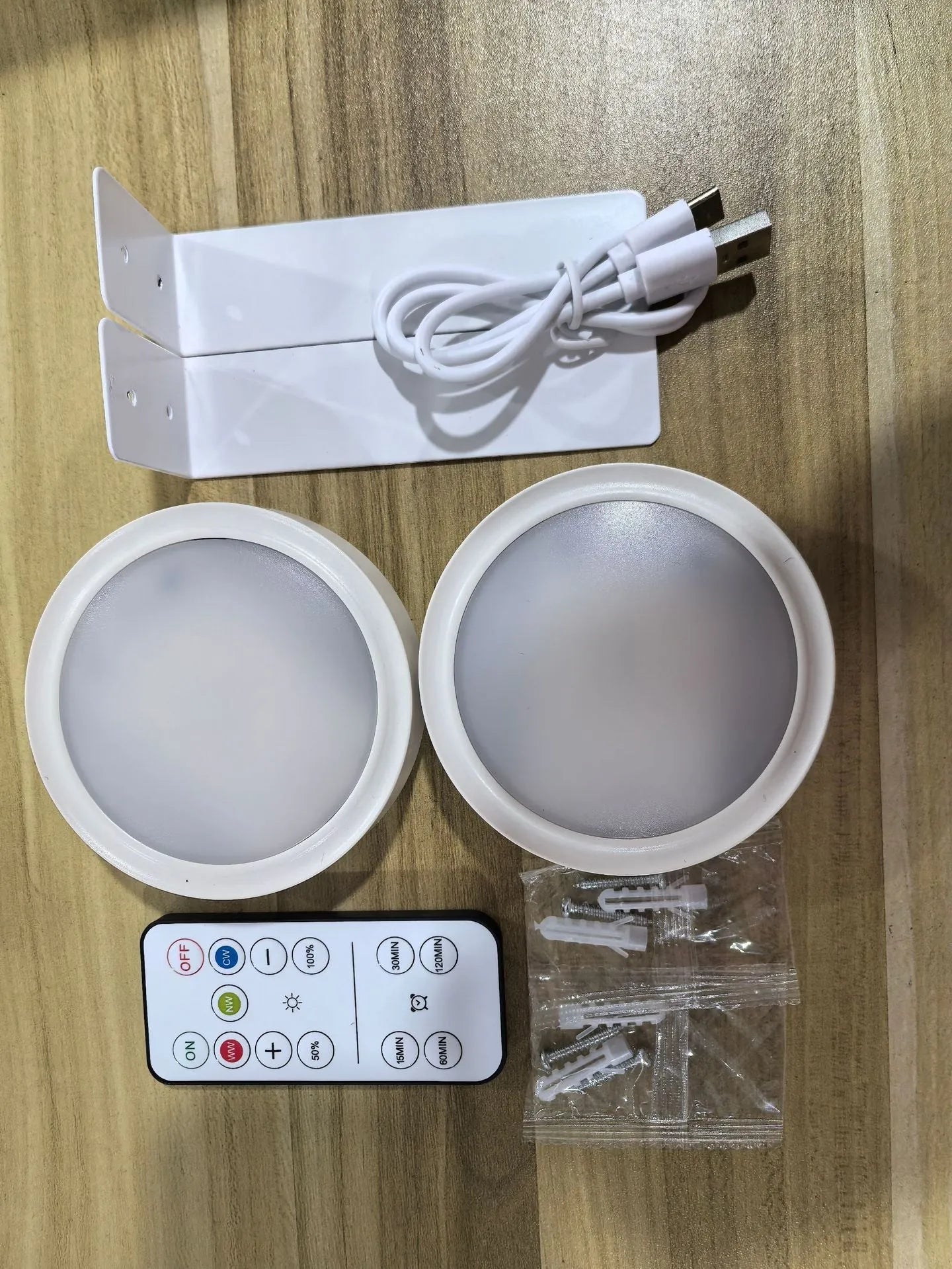 Wireless LED painting lamp with magnetic charging and remote control in black, white or gold finish