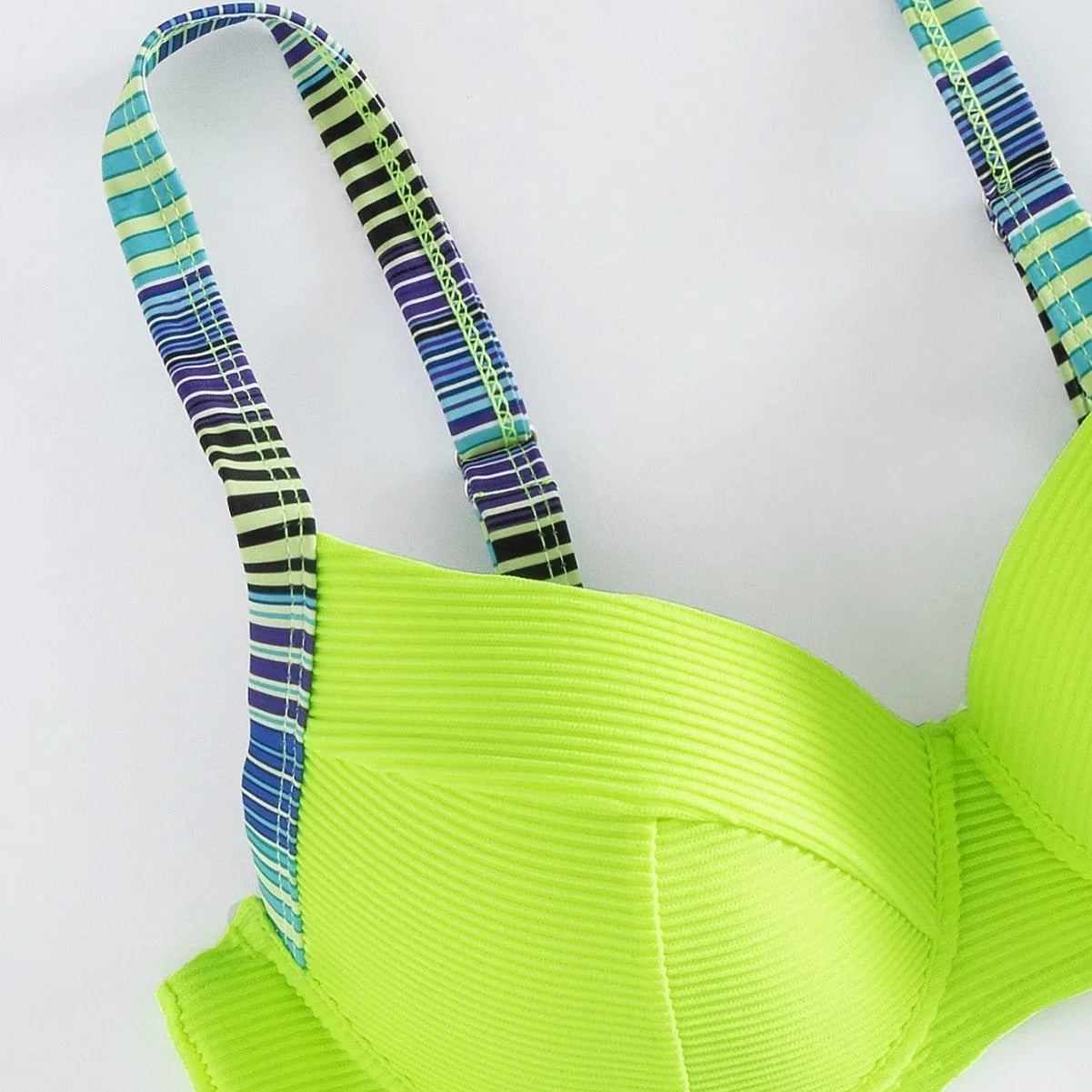 Green printed women's halter bikini set with brief bottoms showing front view