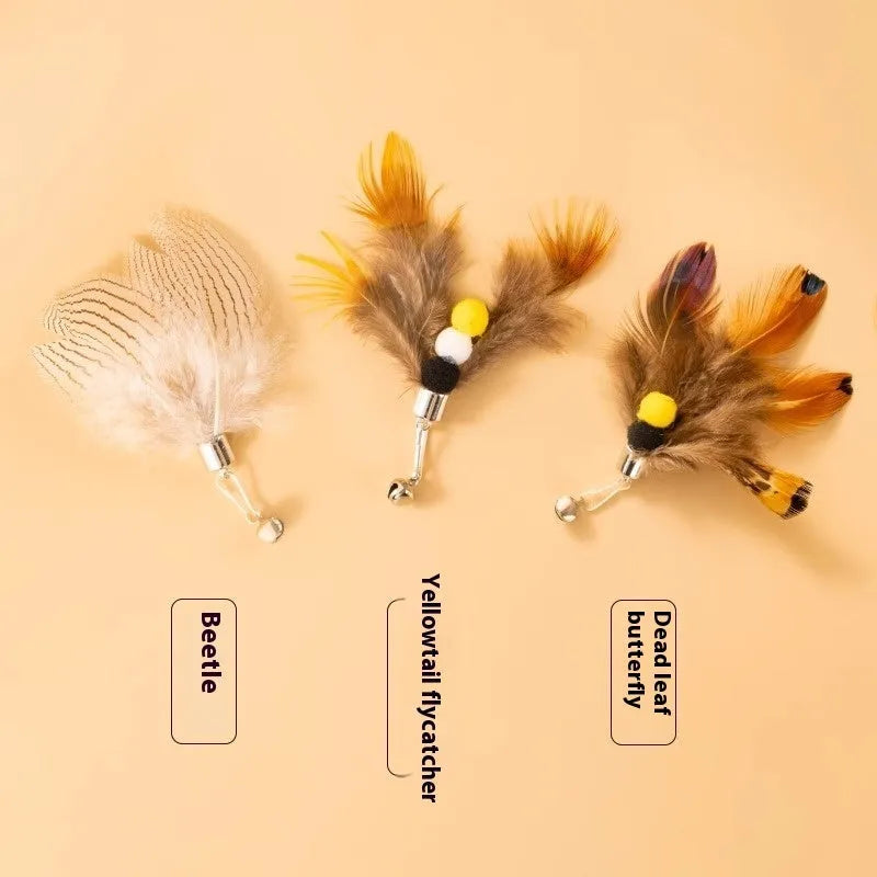 Three steel wire cat toy replacement heads in a small flying insect design on a white background.