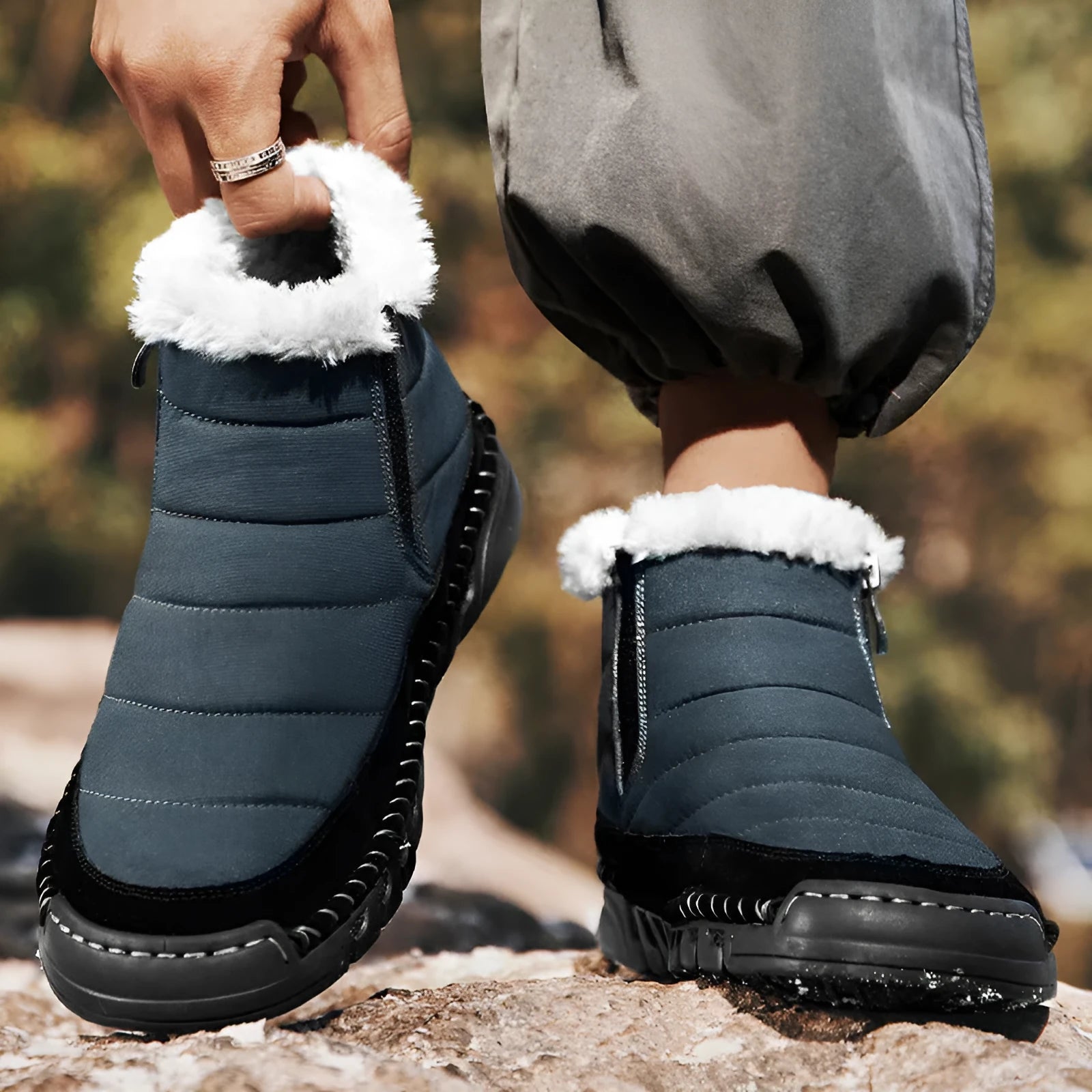 Men's plus size snow boots in black with round toe, flat heel and rubber sole