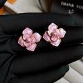 Gold plated copper stud earrings with purple oil-spot glaze flower decorations