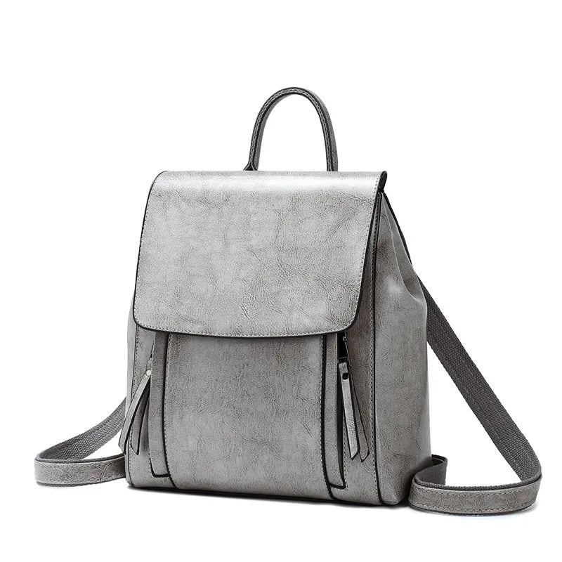 Large genuine leather women's backpack in black with internal organiser pockets and double straps