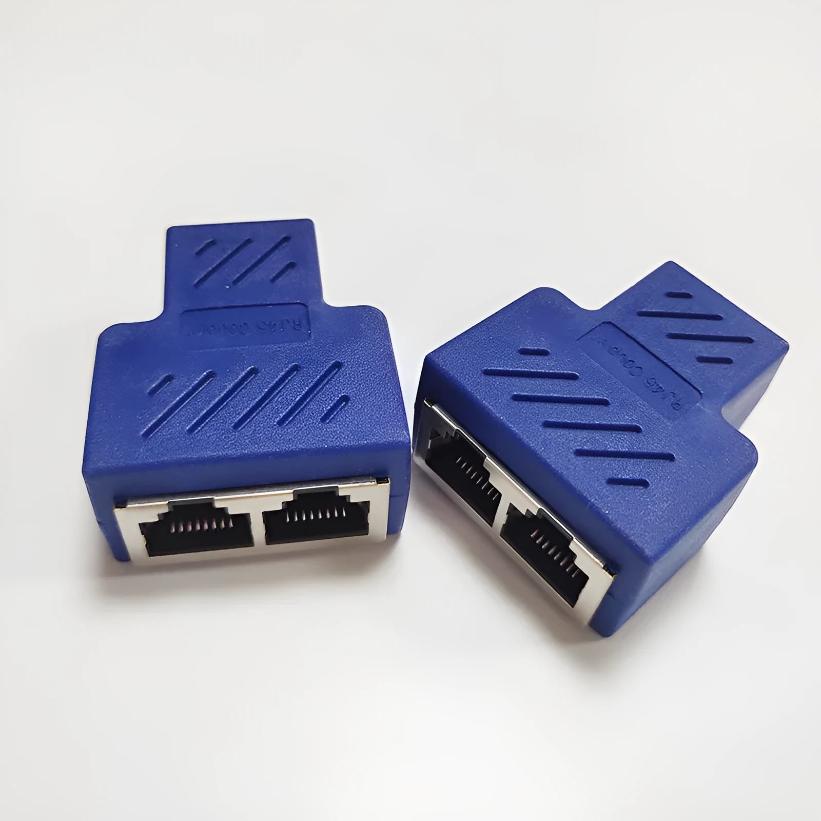 RJ45 network cable splitter adapter showing one input and three output ports in multiple colour options