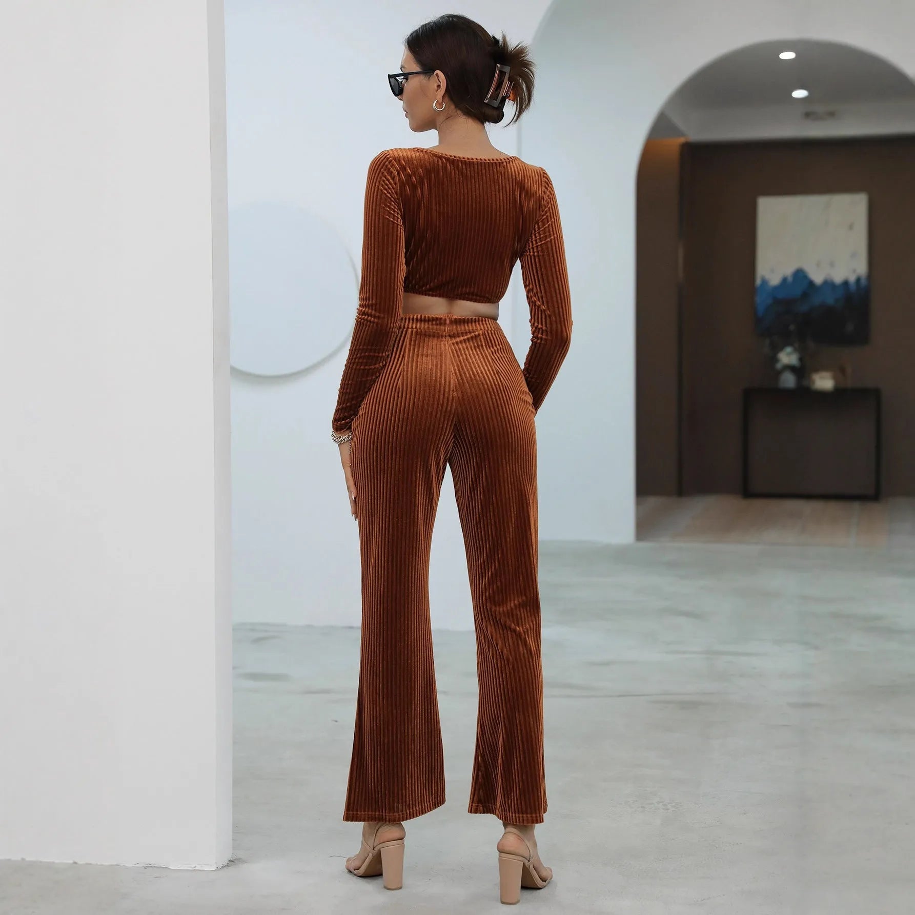 Caramel coloured long sleeve sweater casual set with matching top and trousers on hanger