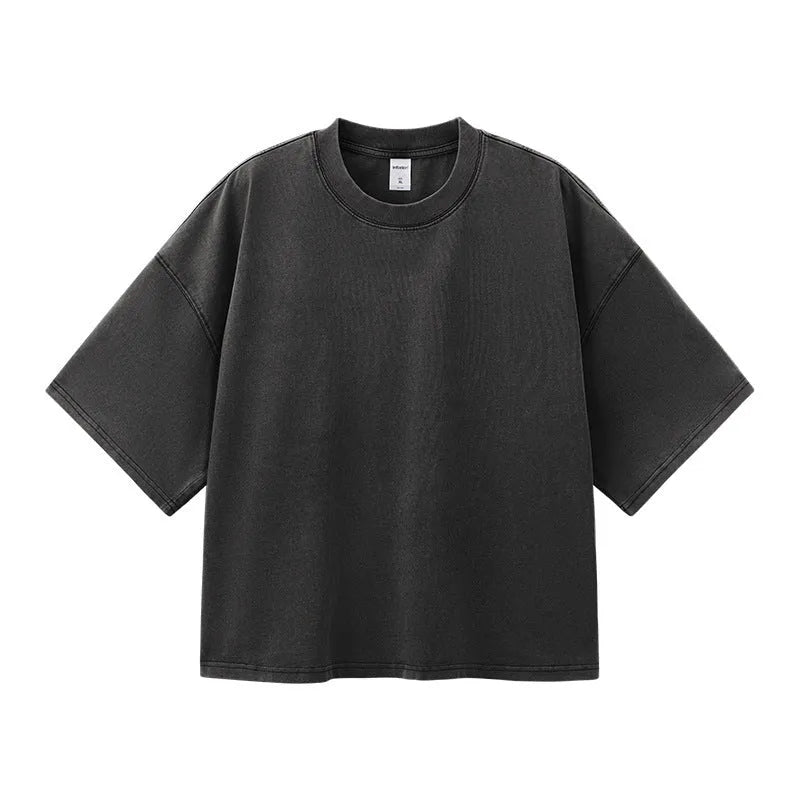 Men's vintage cotton t-shirt with washed-out treatment in khaki light colour showing loose fit and drop-shoulder sleeves