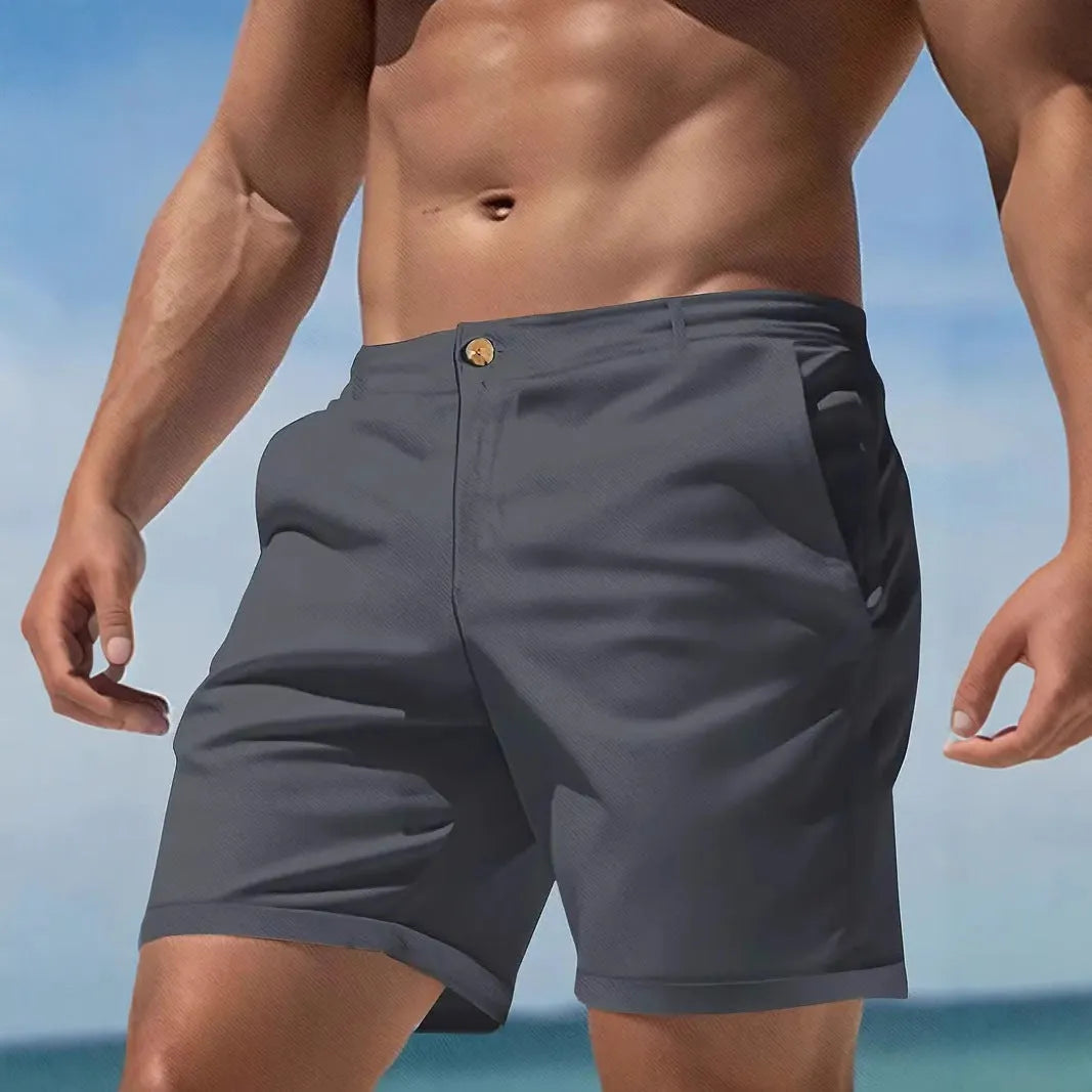 Men's straight-fit cotton blend casual shorts in solid black, shown flat.