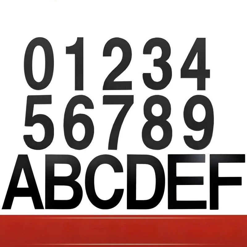 Black stainless steel adhesive house number plate, 7.5cm tall, with separate letters and numbers.
