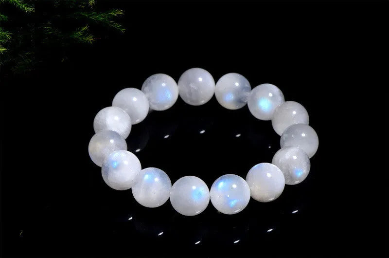 Blue moonlight polished moonstone bead bracelet with round beads in geometric arrangement
