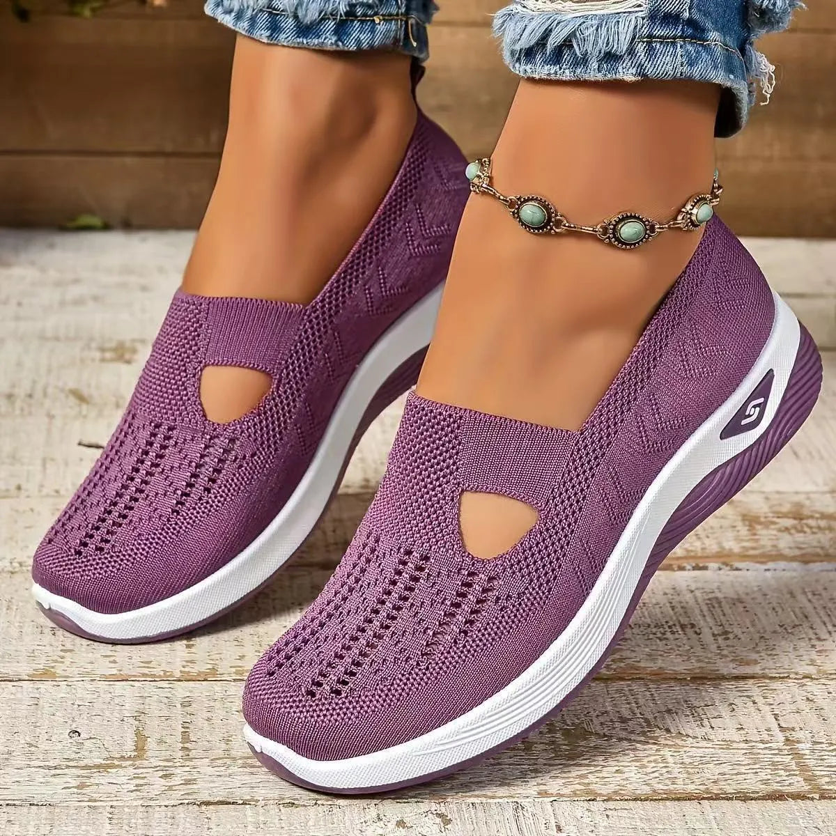 Women's casual mesh shoes with T-strap design and soft PVC soles in light purple colour