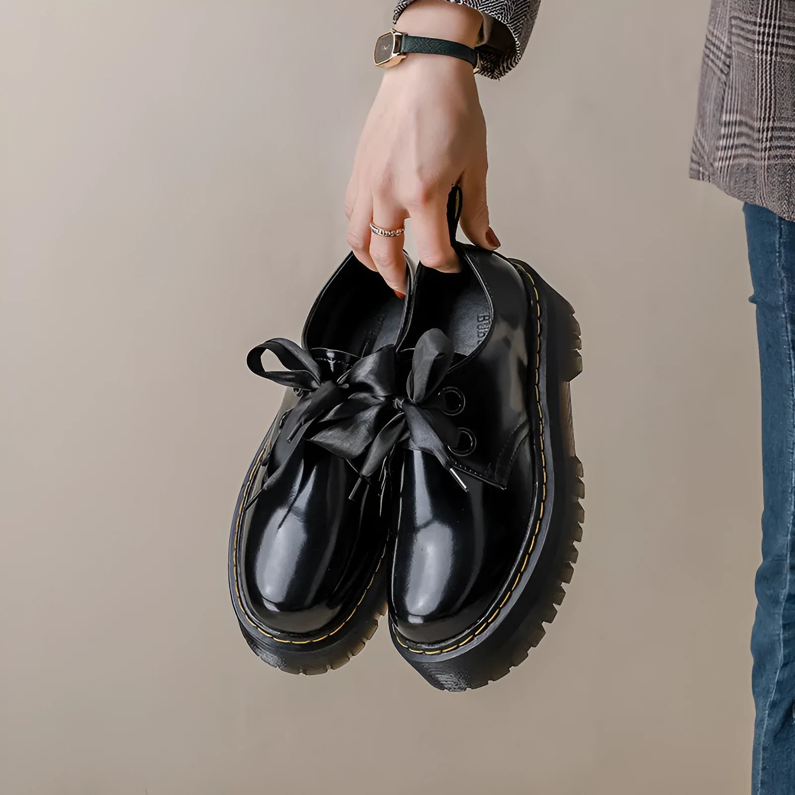 Women's white thick-soled lace-up shoes with ribbon and cross-strap details on a superfine fibre upper.