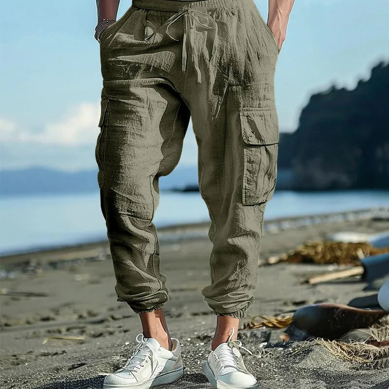 Men's linen casual trousers with drawstring waist and ankle-tied cuffs in solid colours