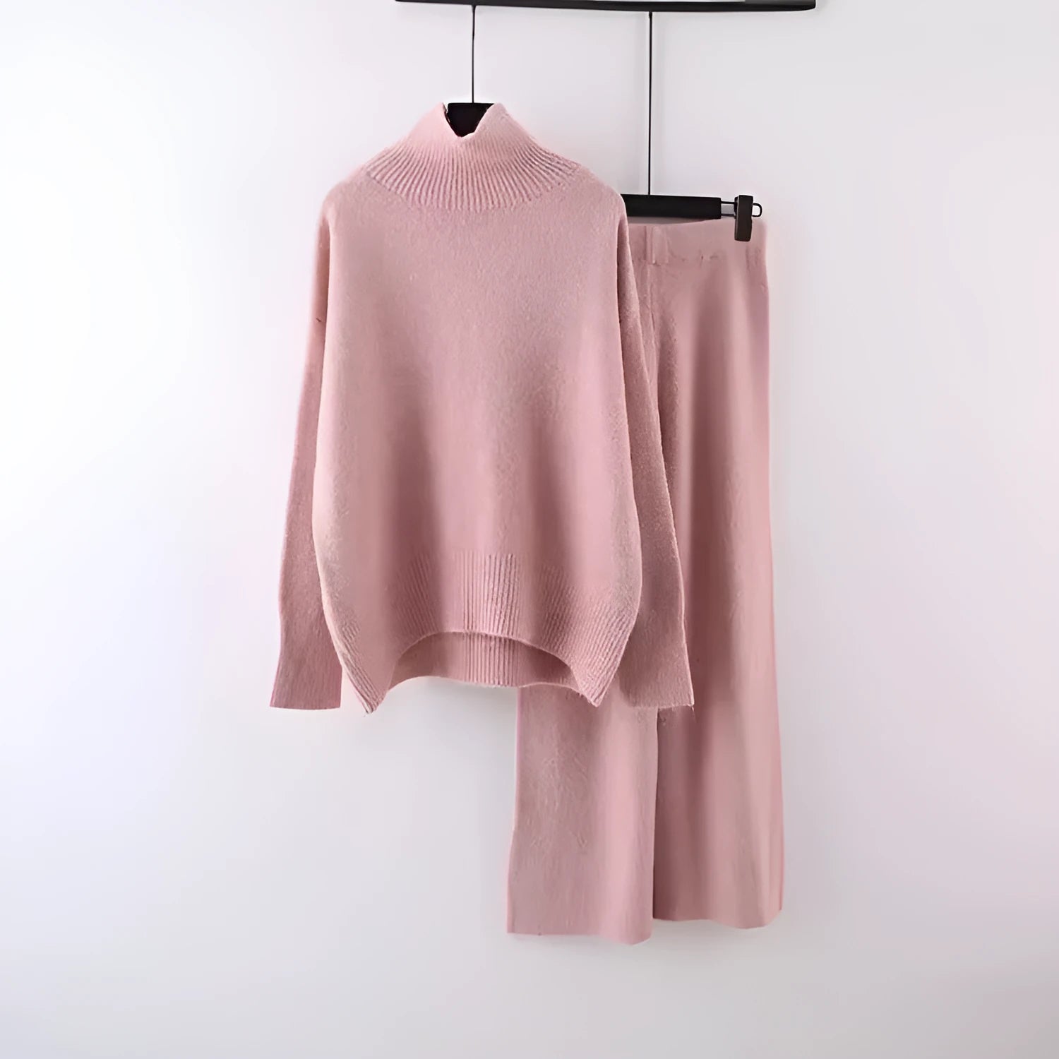 Women's solid colour sweater and wide leg trousers two-piece set in beige, shown as a coordinated outfit.
