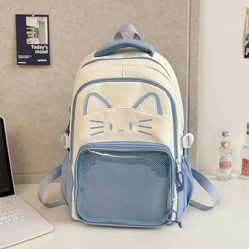 Korean cartoon large capacity nylon backpack in pink colour with badge pendant.