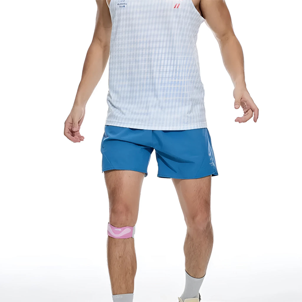 Men's black running shorts with laser stitching detail on a grey background