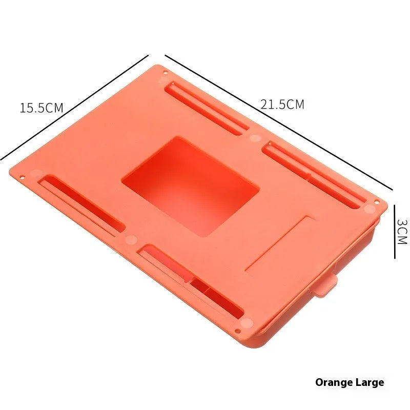 White plastic adhesive storage drawer with a covered grid design, shown mounted under a wooden desk.