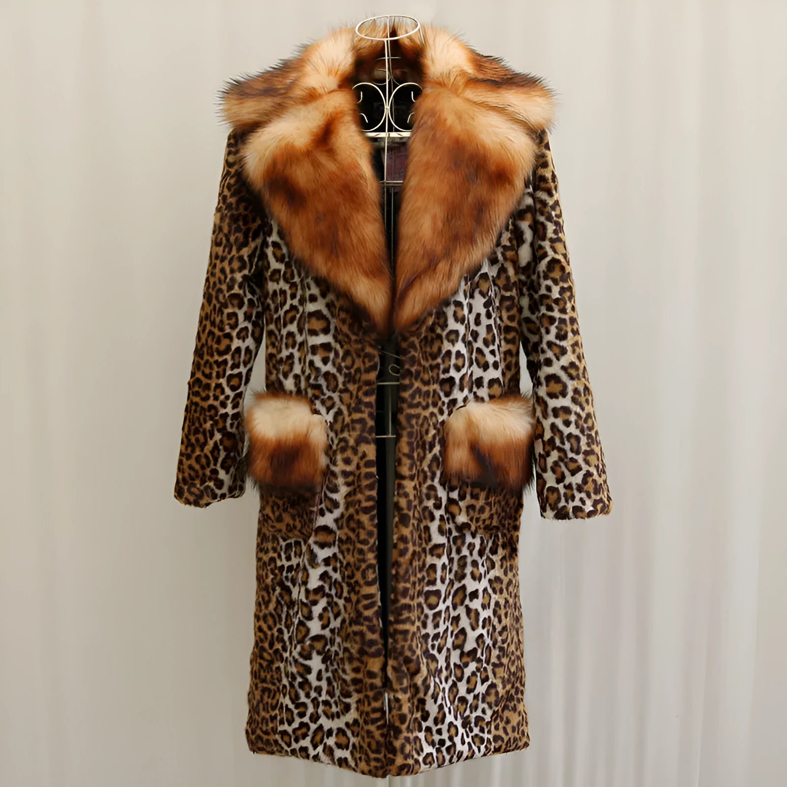 Women's long leopard print artificial fur jacket on a hanger