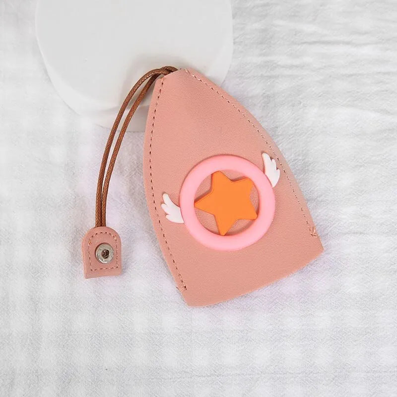 Cartoon pull-out car key case in PU leather with colourful designs measuring 14 x 7.5 cm
