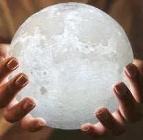 3D printed white moon lamp on wooden stand with touch metal ring at base