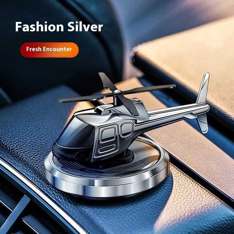 Solar powered metal spinning car perfume air freshener ornament in silver, black and blue colour options