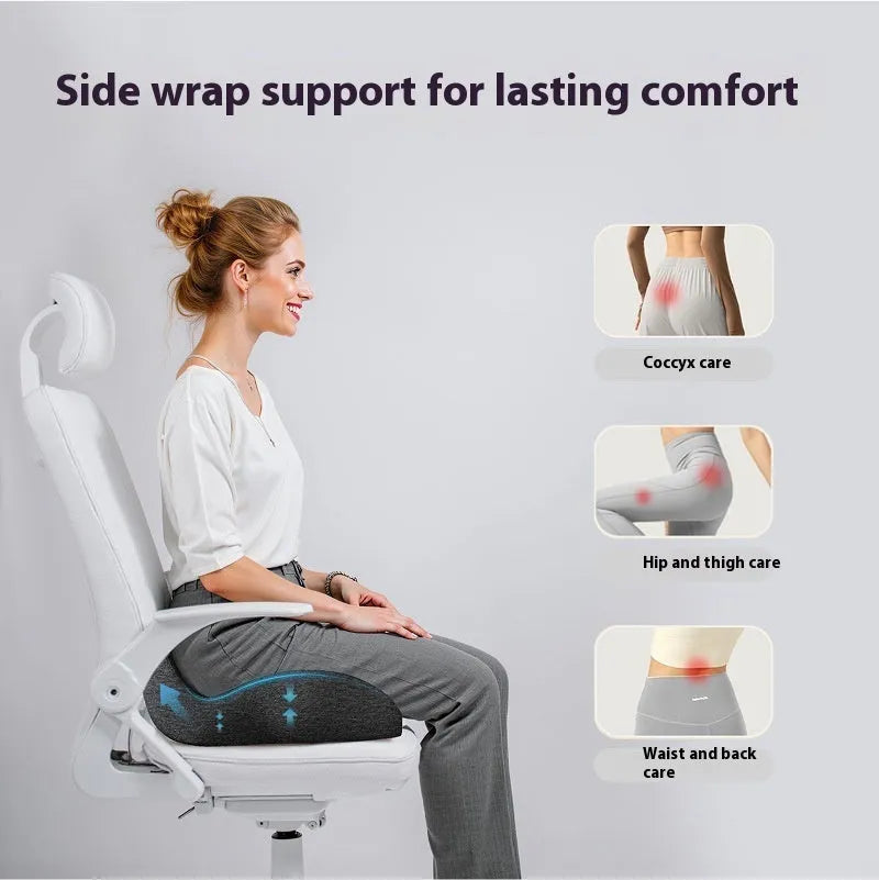 Memory foam office chair seat cushion in light grey, shown on a black office chair.