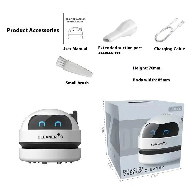 USB charging handheld desktop vacuum cleaner in blue rocket design on computer keyboard
