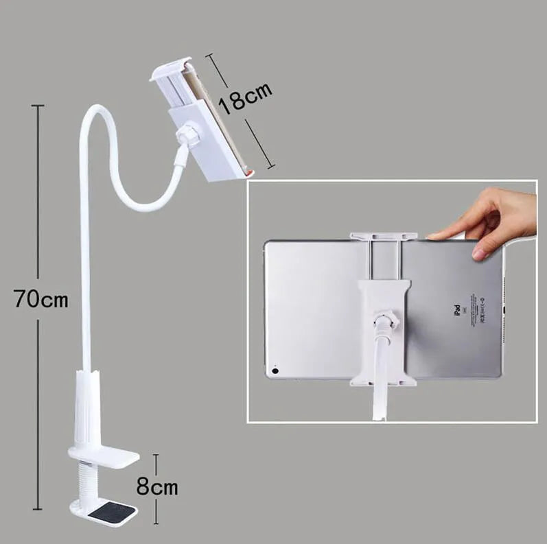 Black adjustable bedside phone holder with long arm on a table