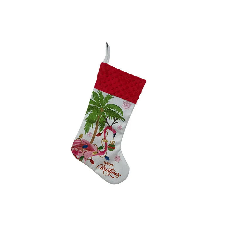 Flamingo Christmas stocking holiday decoration in cloth material measuring 46cm by 28cm