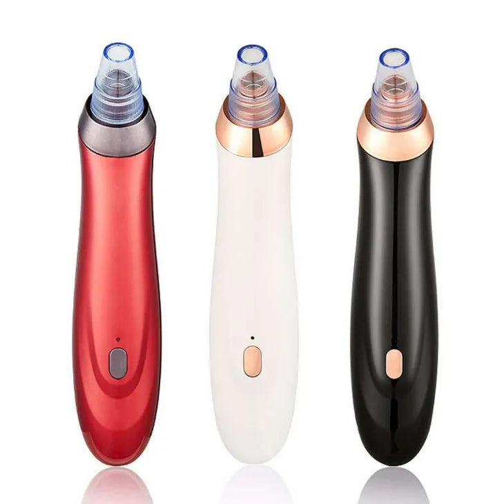 Electric blackhead removal device with multiple nozzle attachments for facial pore cleaning