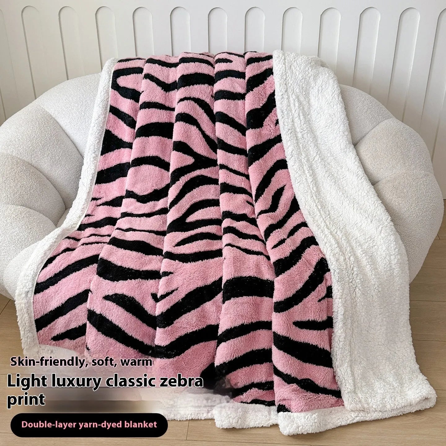 Double-layer Jacquard taffeta blanket with leopard print design in camel colour folded to show texture and pattern detail