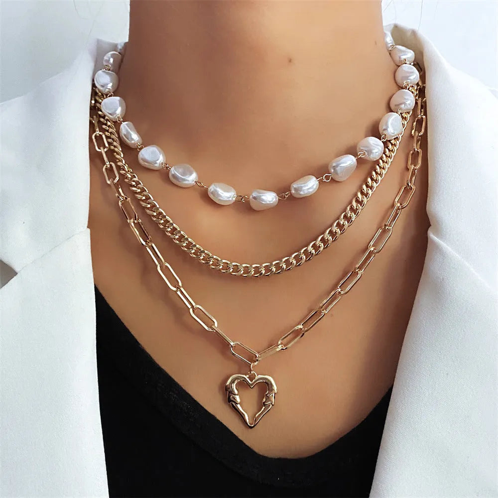Vintage heart-shaped alloy necklace with pearl chain and electroplated gold finish