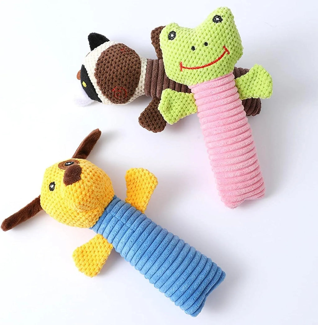 Soft plush dog chew toy in animal shape with squeaker, shown with size scale.