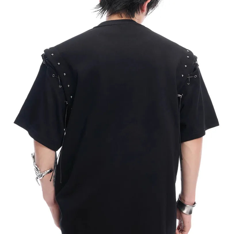 Women's short sleeve top with side lace-up detail and geometric cutouts in black colour