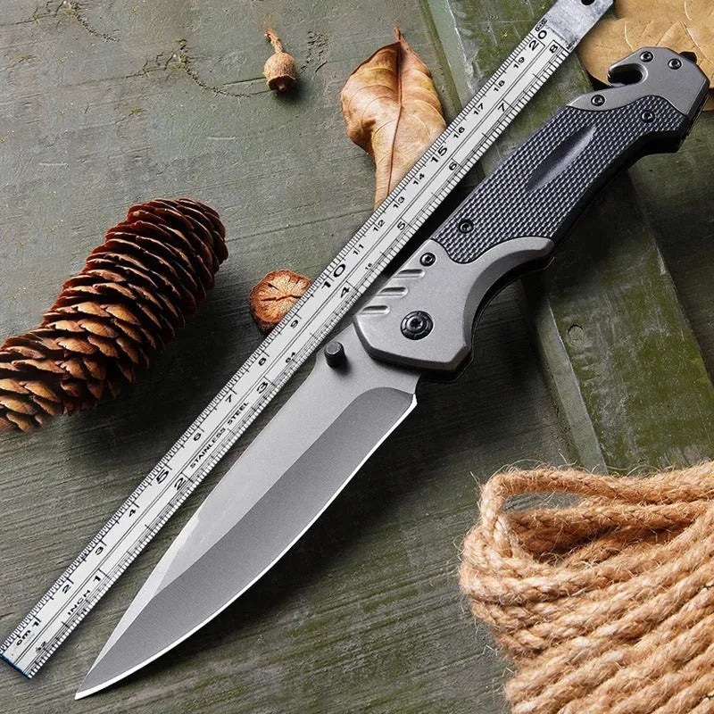 Alloy folding knife showing blade details and folded position with measurement indicators