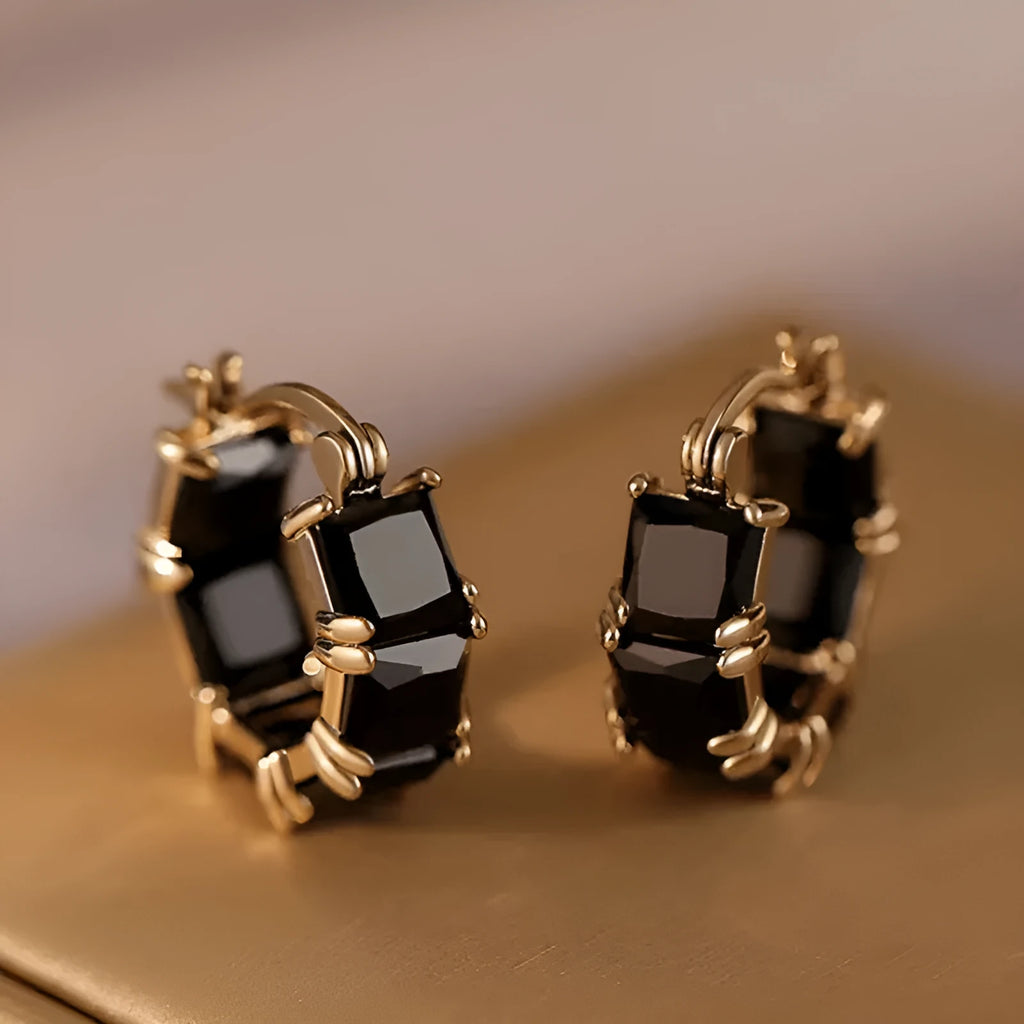 Geometric U-shaped women's earrings with round zircon elements and gold electroplated finish