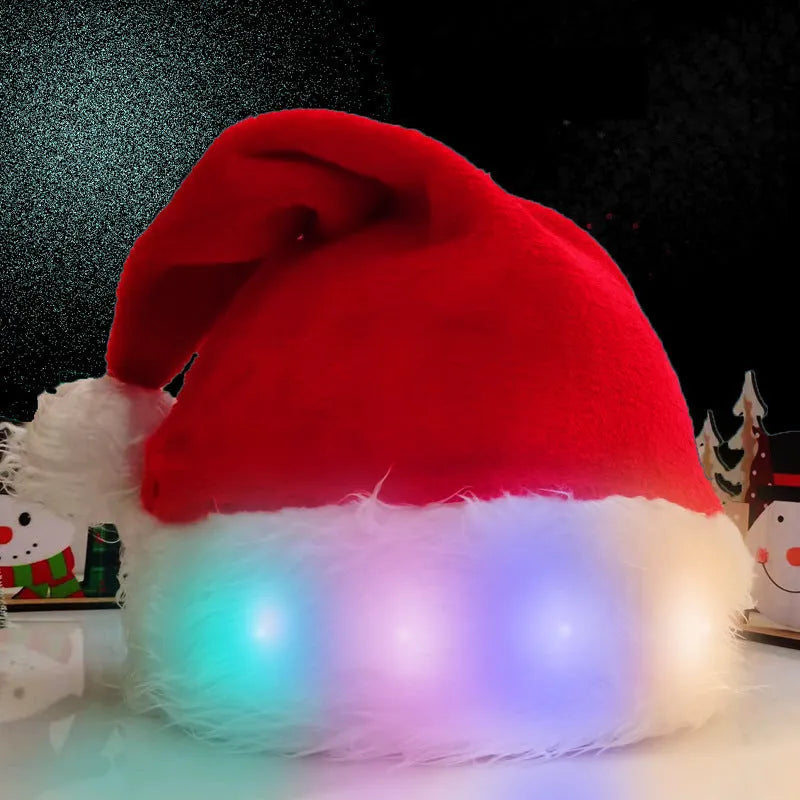 Red and white plush LED Santa hat with pom-pom and multi-coloured twinkling lights on.